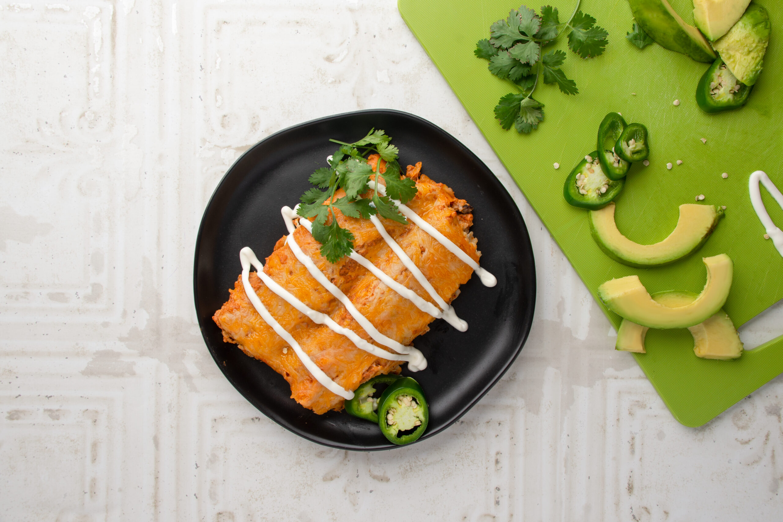 Spicy Chicken, Black Bean, and Pumpkin Enchiladas